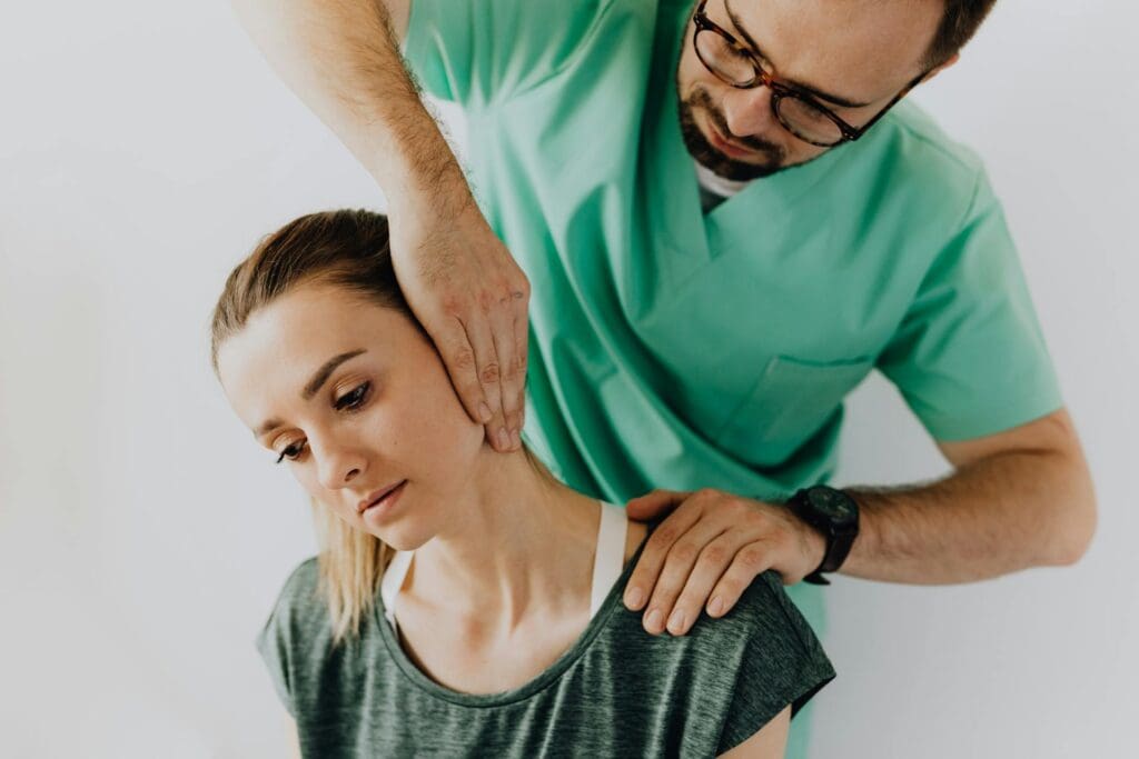 Chiropractor stiff neck posture evaluation and therapy session