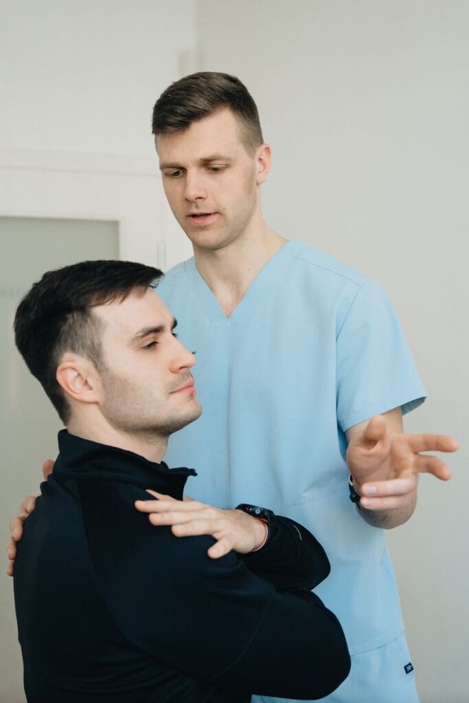 Man receiving treatment from Reno chiropractors